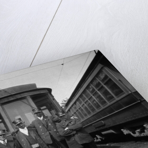 1900s Conductors Posing In Front Of Trolley Car by Anonymous