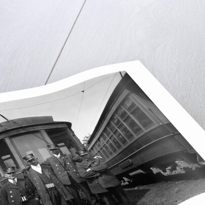 1900s Conductors Posing In Front Of Trolley Car by Anonymous