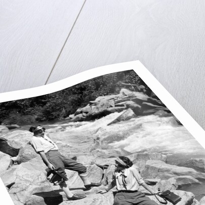 1920s Two Women Sisters On Rocks By Creek Talking Holding Folding Camera by Anonymous