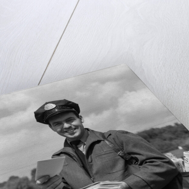 1950s Man Postman Holding Out Letter by Anonymous