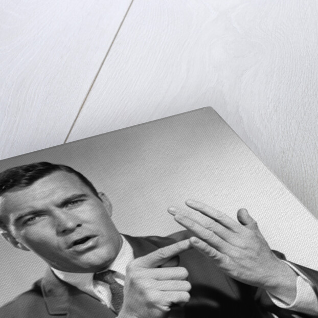 1950s Earnest Salesman Talking Gesturing With Hands by Anonymous