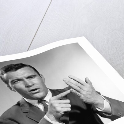 1950s Earnest Salesman Talking Gesturing With Hands by Anonymous