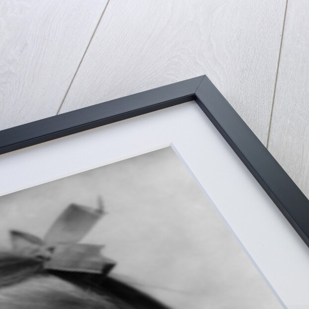 1930s Young Girl Outdoor Portrait With Freckles And Bow In Hair At Camera by Anonymous