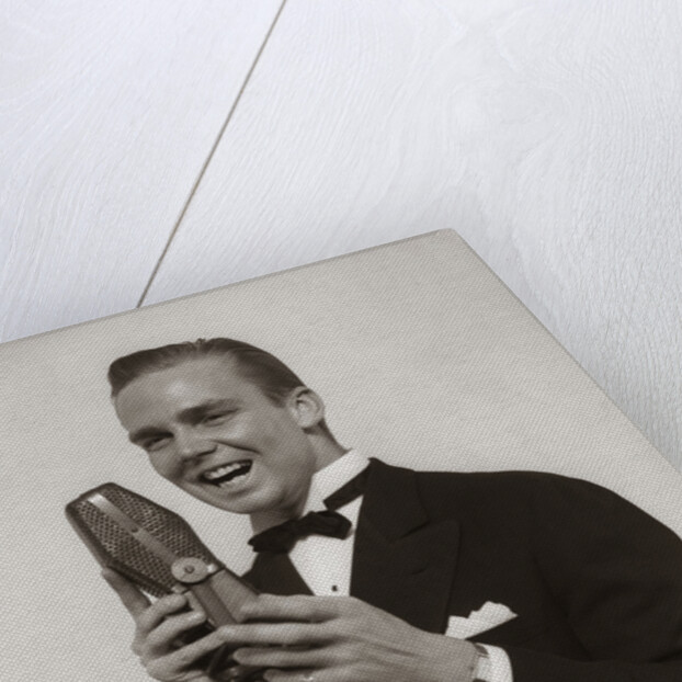 1920s 1930s Man Radio Singer Entertainer Crooner In Tuxedo Singing Into Microphone by Anonymous