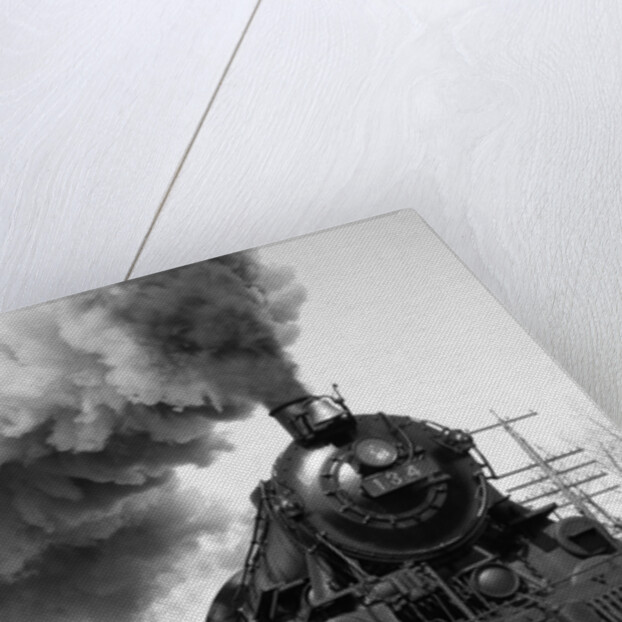 1920s 1930s Steam Engine Pulling Passenger Train Smoke Billowing From Exhaust Stack by Anonymous