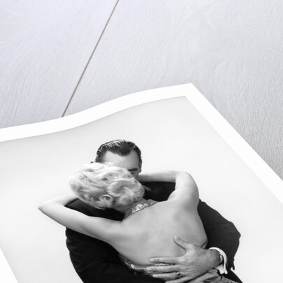 1950s 1960s Wife In Backless Satin Gown Evening Dress And Husband Embracing And Kissing by Anonymous