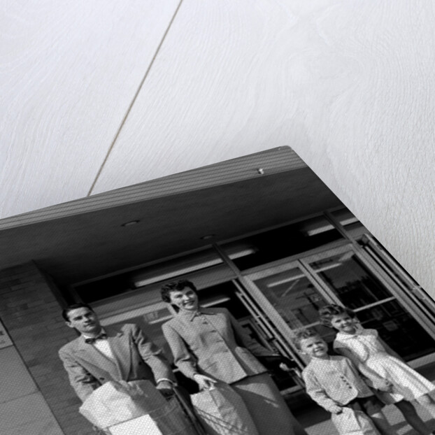 1950s Family Walking Out Of Supermarket Store by Anonymous