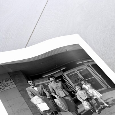 1950s Family Walking Out Of Supermarket Store by Anonymous