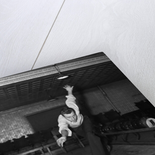 1930s Man Bowling Just Releasing Ball Into Alley by Anonymous