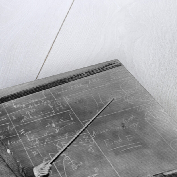1930s Man Teacher Looking At Camera With Pointer At Blackboard by Anonymous