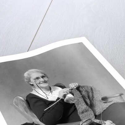 1930s Elderly Woman Wearing Pince-Nez Glasses Sitting Knitting by Anonymous