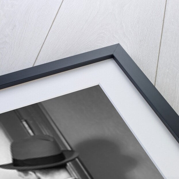 1930s 1940s Man In Suit And Hat Opening Door Marked Loans by Anonymous