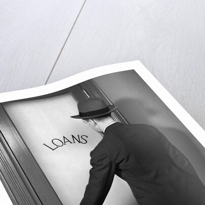 1930s 1940s Man In Suit And Hat Opening Door Marked Loans by Anonymous