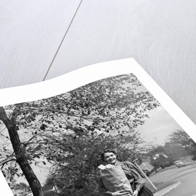1950s Woman Walking On Sidewalk Carrying A Grocery Bag Full Of Food by Anonymous
