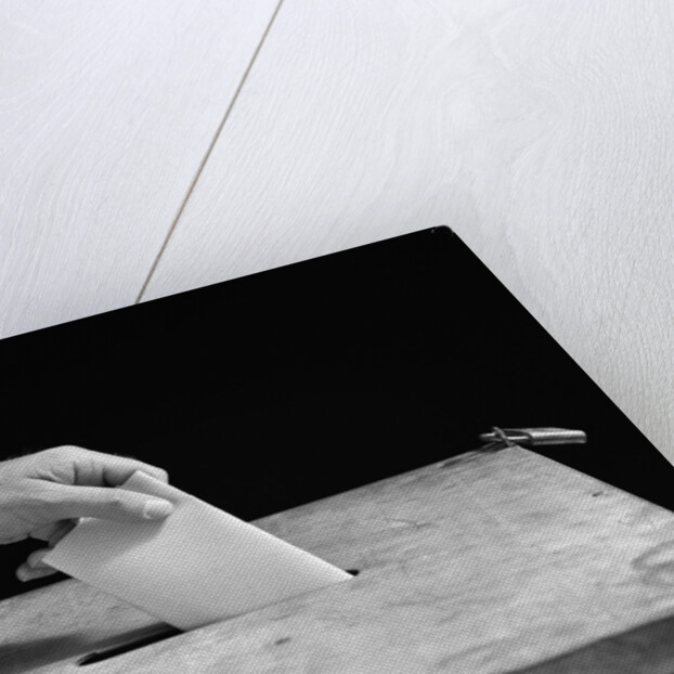 1930s 1940s Male Hand Dropping Paper Ballot In Voting Box by Anonymous