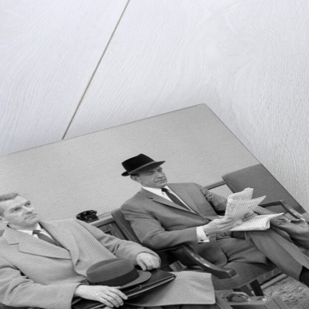1950s 1960s Two Men Businessman Salesman Sitting In Office Reception Waiting Area Indoor by Anonymous
