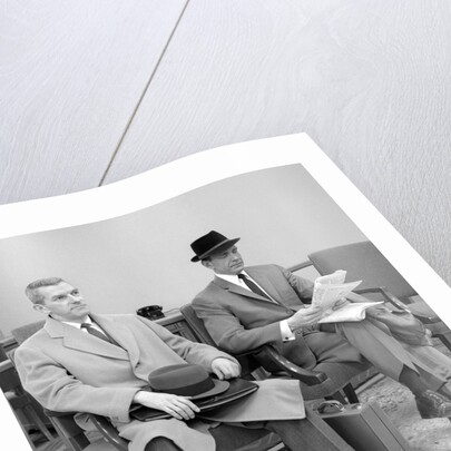 1950s 1960s Two Men Businessman Salesman Sitting In Office Reception Waiting Area Indoor by Anonymous