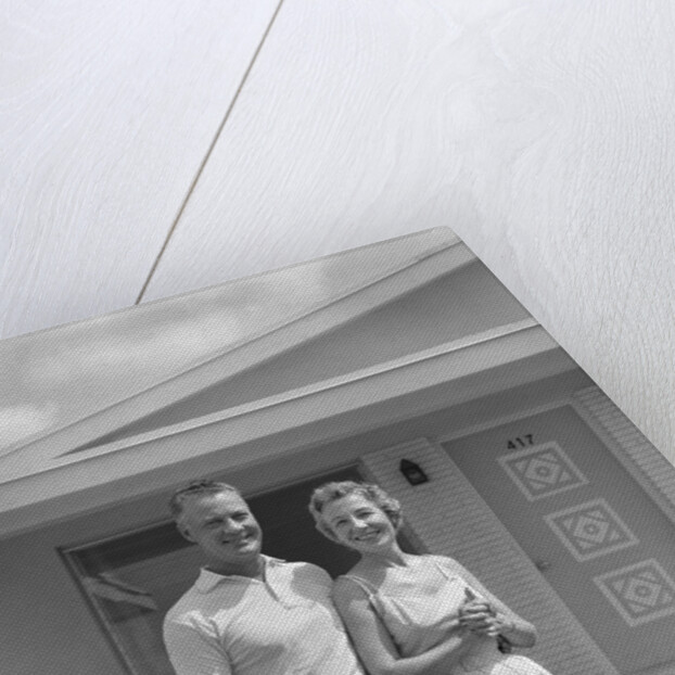 1950s Older Man Woman Senior Citizen Standing Together In Retirement Home Front Yard by Anonymous