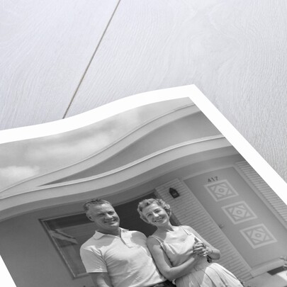 1950s Older Man Woman Senior Citizen Standing Together In Retirement Home Front Yard by Anonymous