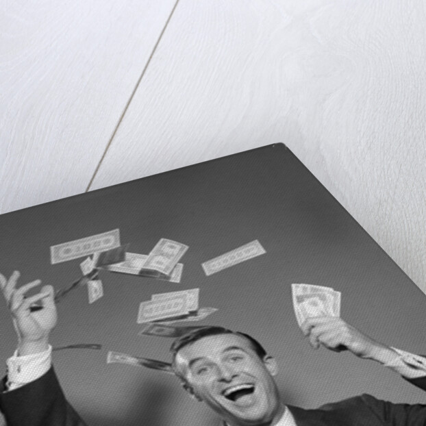 1960s Happy Man Throwing Money Currency Bank Notes In The Air by Anonymous