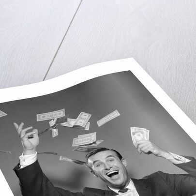 1960s Happy Man Throwing Money Currency Bank Notes In The Air by Anonymous
