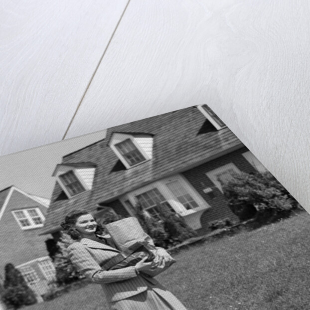 1940s Woman Walking Shopping Carrying Grocery Bag On Suburban House Sidewalk by Anonymous