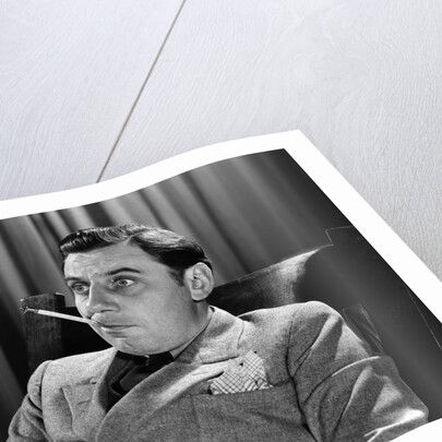 1930s Bug-Eyed Man With Thermometer In Mouth by Anonymous