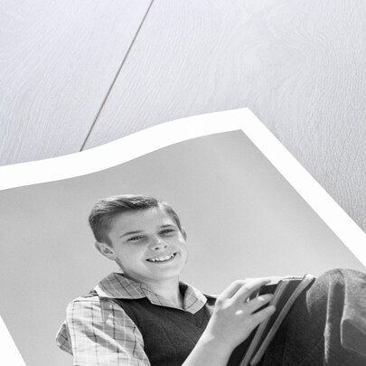 1930s 1940s Teenage Boy Sitting Holding School Notebooks by Anonymous
