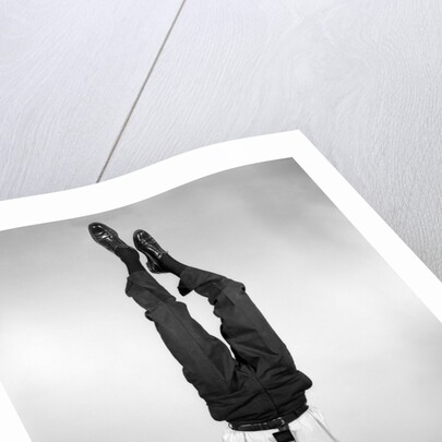 1960s Man In Shirt and Tie Standing On Head by Anonymous