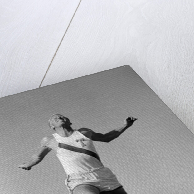 1960s Man Running Winning Sprinting Across The Finish Line Outdoor by Anonymous