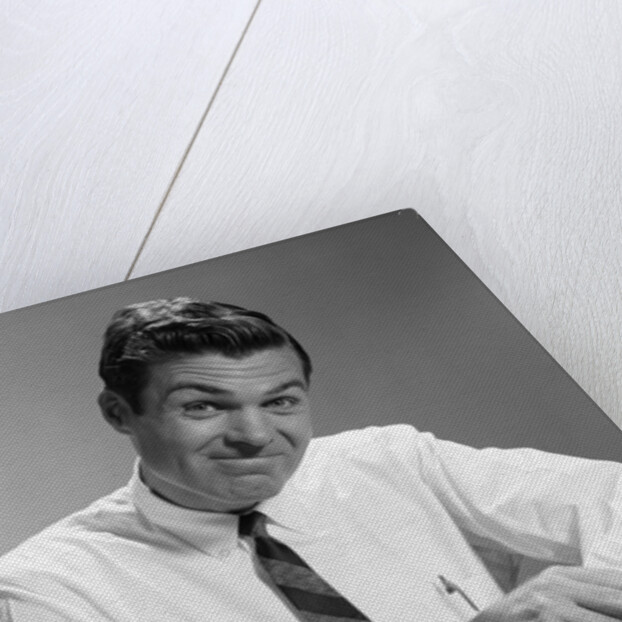 1960s Man In Business Shirt And Tie Rolling Up His Sleeves To Work Determined Look Studio by Anonymous