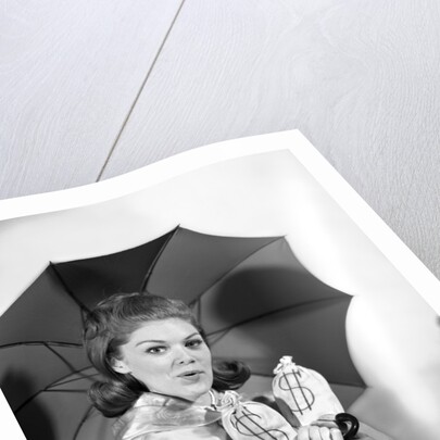 1960s Woman With Umbrella Holding Bags Of Money Save Your Money For A Rainy Day by Anonymous