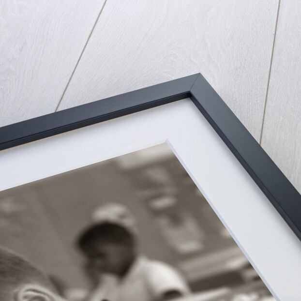 1960s Boy Striped T-Shirt Elementary School Classroom Sitting Desk Writing Test by Anonymous