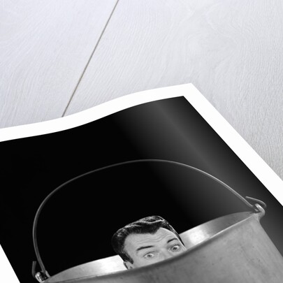 1950s 1960s Symbolic Montage Portrait Man In The Soup Looking Wide Eyed From Inside The Kettle by Anonymous