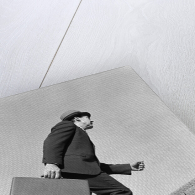 1960s Salesman Briefcase In Hand Climbing Steep Hard Steel Tread Stairs by Anonymous