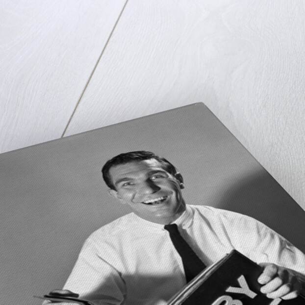 1960s Man Father Holding Baby Care Book by Anonymous