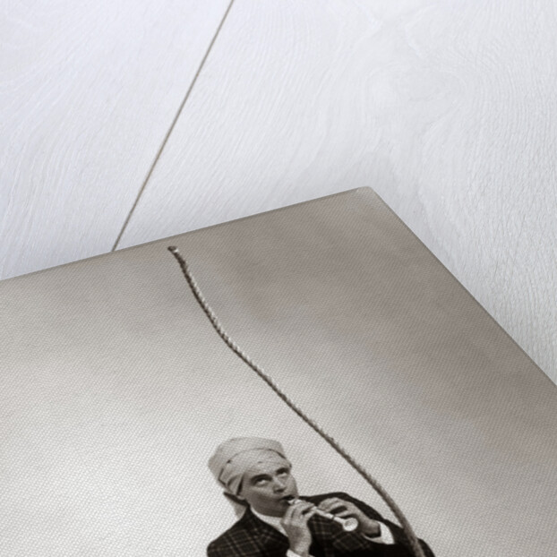 1960s Man Snake Charmer Character In Turban Plaid Jacket Shorts Knee Socks by Anonymous