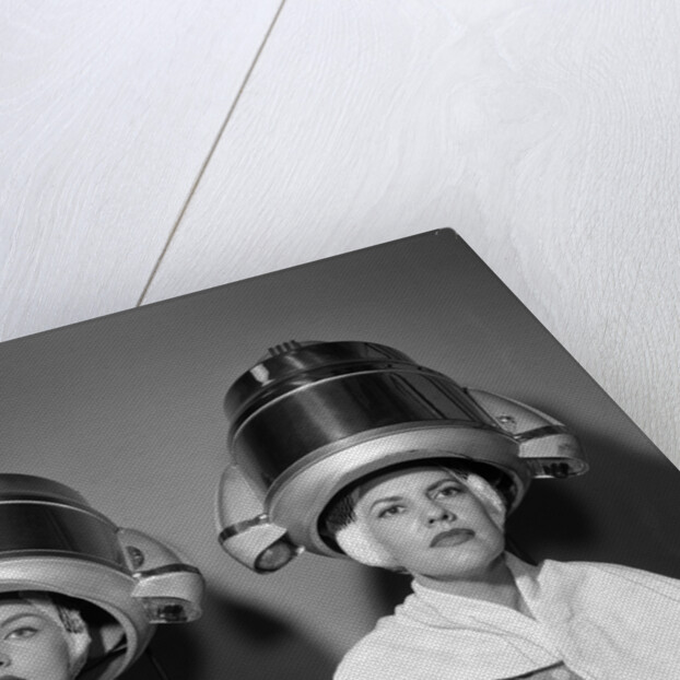 1950s Two Women Under Hair Dryers Towels Around Shoulders Hair Nets by Anonymous