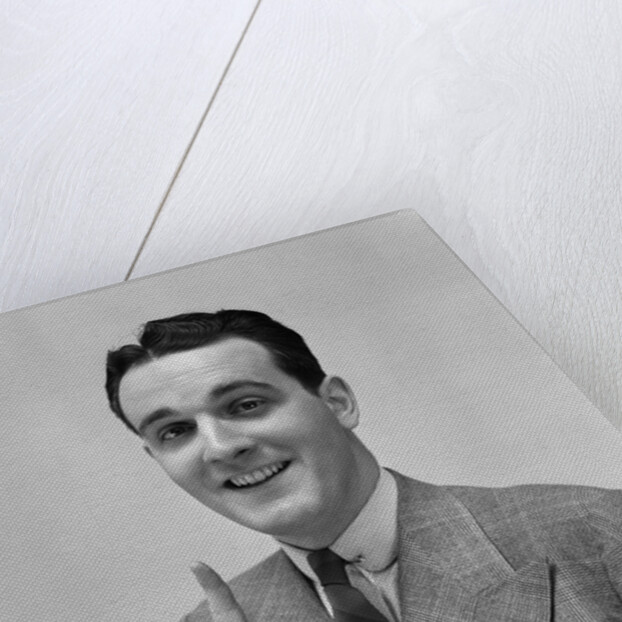 1940s Man In Suit Holding Up Index Finger Making A Point by Anonymous