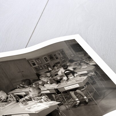 1960s Elementary Classroom Children At Desks Writing Studying by Anonymous