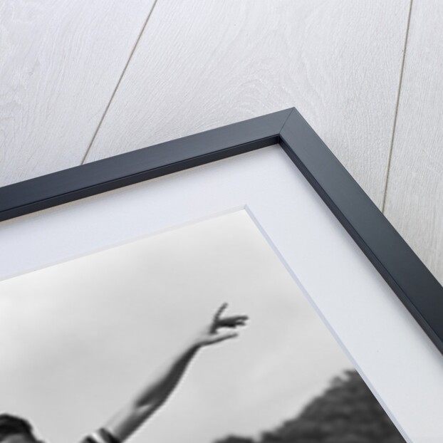 1930s Teenage Boy Tennis Player Jumping Net With Racket In Hand by Anonymous
