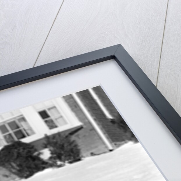1930s 1940s Little Boy Playing In Toy Car Outside In Snow by Anonymous