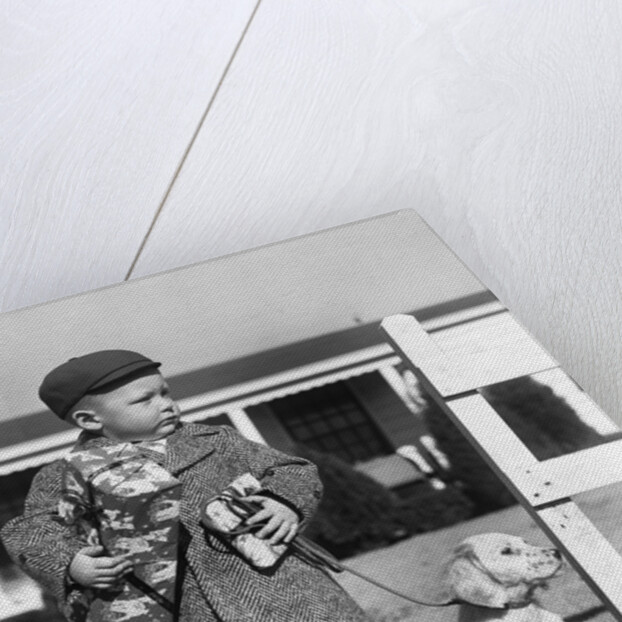 1940s Boy With Puppy On Leash Holding Christmas Present by Anonymous