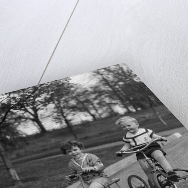 1930s Two Boys Riding Tricycles by Anonymous