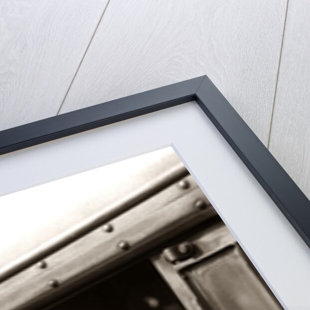 1920s 1930s 1940s Railroad Train Engineer Looking Out Window Of Locomotive Cab Driving The Steam Engine by Anonymous