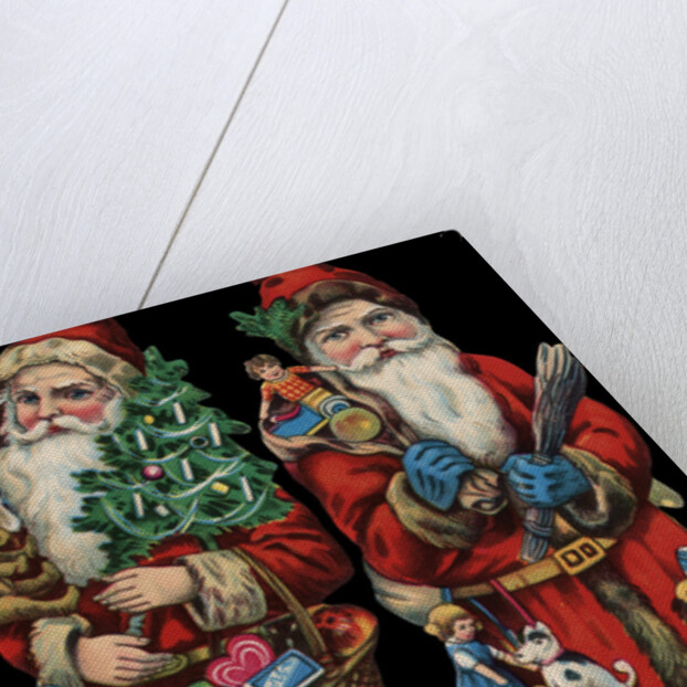 Die-Cut Scraps with Two Santa Clauses by Anonymous
