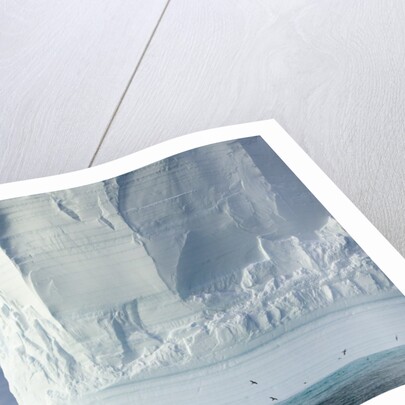 Massive Tabular Iceberg Sculpted by Waves by Anonymous