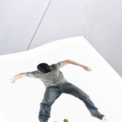 Young Skateboarder Doing Trick by Anonymous