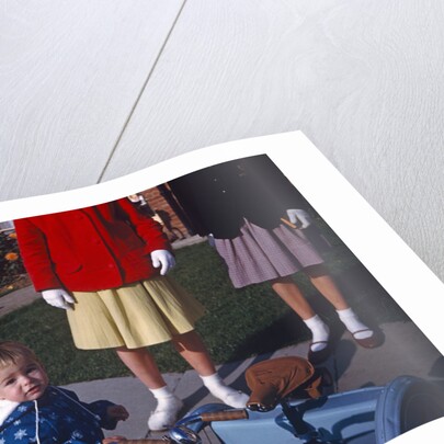 England - Westcliff - Young boy with 1960's teenagers by Anonymous