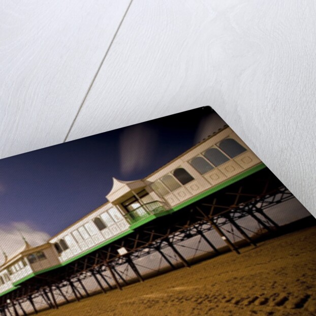 Pier at Lytham St. Annes extends over a sandy beach by Anonymous
